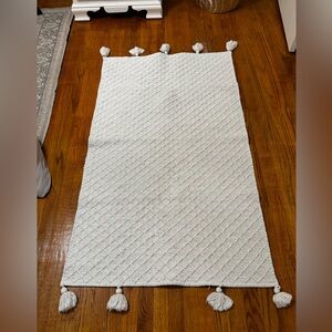 Textured Cream Bath Mat with Tassels